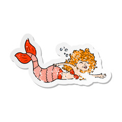 distressed sticker of a cartoon mermaid