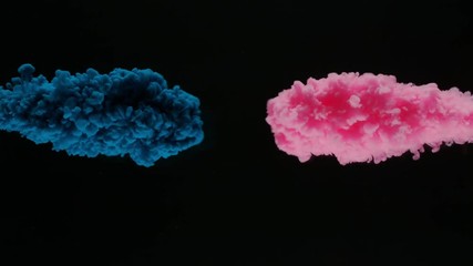 Super slowmotion shot of color inks in water. Shot with high speed camera at 4K.