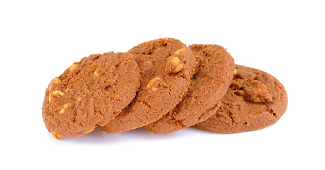 Heap of chocolate chip cookies isolated on white background