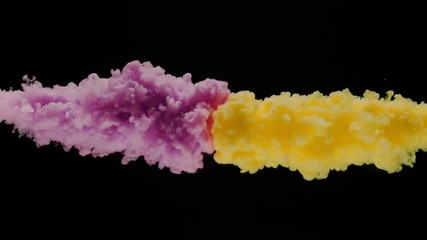Super slowmotion shot of color inks in water. Shot with high speed camera at 4K.