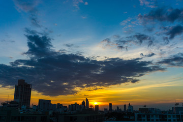 Fototapeta premium Sunset building with colorful sky cloud