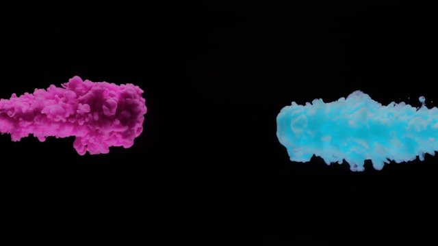 Super slowmotion shot of color inks in water. Shot with high speed camera at 4K.