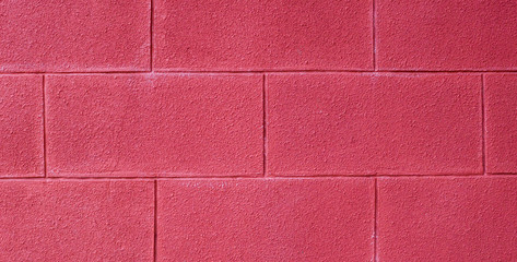 wall of brick painted red background. texture.