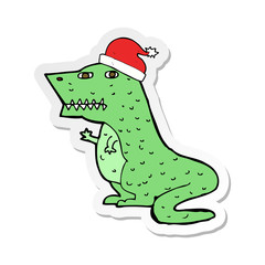 sticker of a cartoon dinosaur in christmas hat