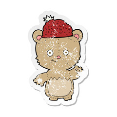retro distressed sticker of a cartoon bear in hat