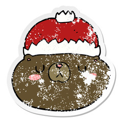 distressed sticker of a cartoon christmas bear