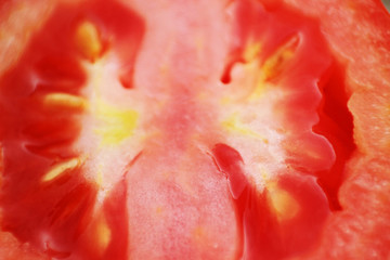 Macro half of red tomato