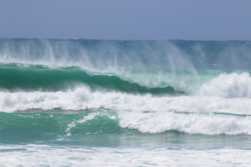 Cyclone Oma swell hitting Kirra beach Coolangatta Gold Coast Australia tube barrel waves spray