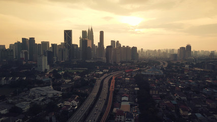 Naklejka premium View of Kuala Lumpur skyline during sunrise