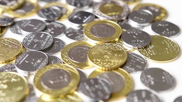 Saudi Riyal Coins Rotating. Saudi Arabia currency. Slow motion.