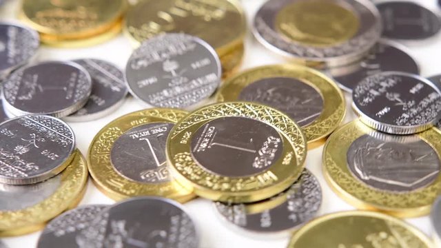Saudi Riyal Coins Rotating. Saudi Arabia currency.