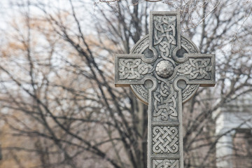 Christian symbol. Old Vintage Cross at Catholic Cemetery.