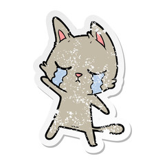 Obraz na płótnie Canvas distressed sticker of a crying cartoon cat