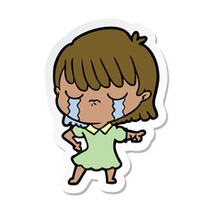 sticker of a cartoon woman crying