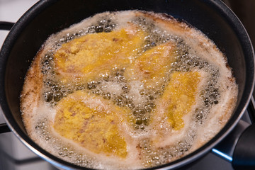Frying cuttings in a pan. 