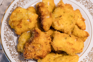 Fried cutlets on a plate.