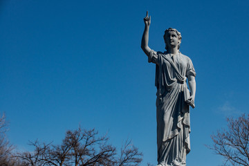 Fototapeta premium Beautiful Vintage Sculpture at old Catholic cemetery.
