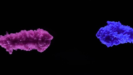 Super slowmotion shot of color inks in water. Shot with high speed camera at 4K.