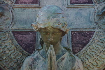 Beautiful Vintage Sculpture at old Catholic cemetery.