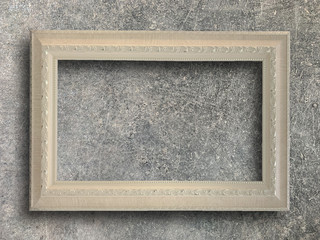rustic picture frame on cement wall