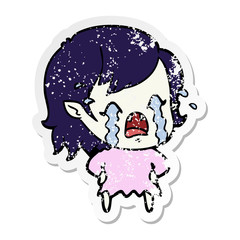 distressed sticker of a cartoon crying vampire girl