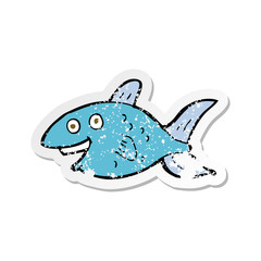 retro distressed sticker of a cartoon fish