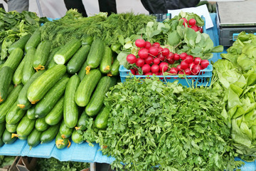 fresh  radish parsley and  cucumbers vegetables  in  street stock