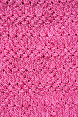 pink color knitted wool as background