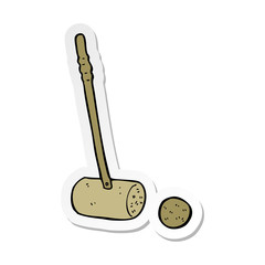 sticker of a cartoon croquet mallet and ball
