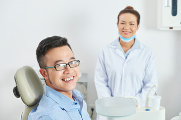 Happy patient after dental treatment