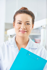 Female doctor with folder
