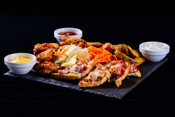 hot sandwiches on a dark background, set of snacks