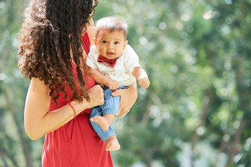 Woman with baby outdoors