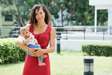 Happy woman with baby boy