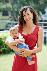 Happy mother with her little son