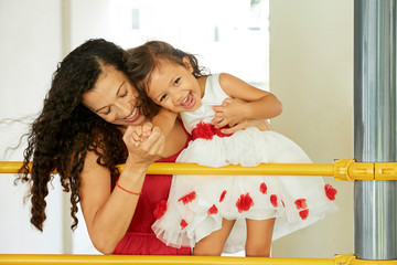 Mother playing with her daughter