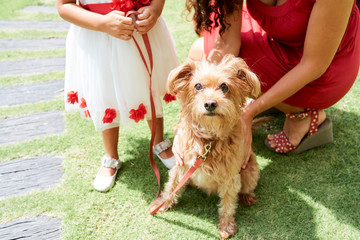 Family with pet outdoors