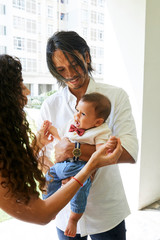 Parents with child outdoors