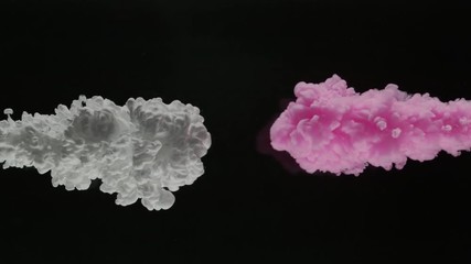 Super slowmotion shot of color inks in water. Shot with high speed camera at 4K.