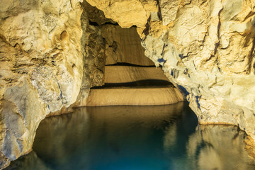 Cave lake nature background.