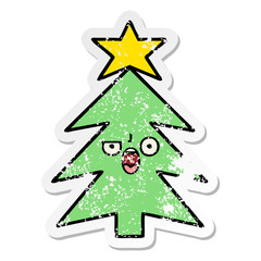 Fototapeta premium distressed sticker of a cute cartoon christmas tree