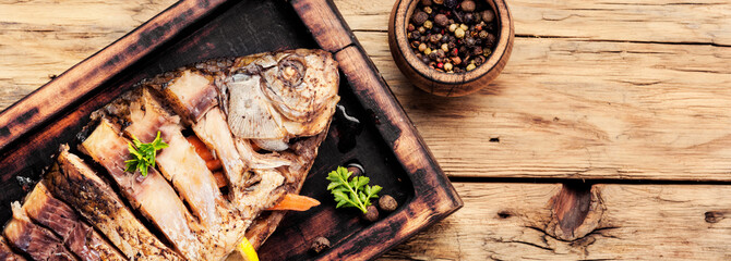 Carp stuffed with vegetables