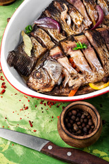 Carp stuffed with vegetables