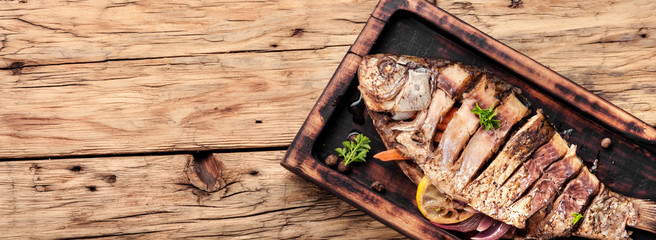 Carp stuffed with vegetables