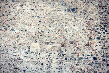 Stone slabs texture background, wall of Castello Ursino, ancient castle in Catania, Sicily, Southern Italy.