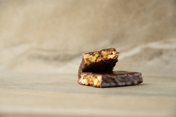 Muesli and cereal bar on marble stone background