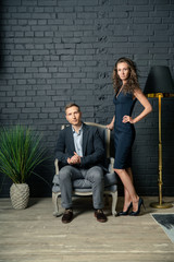 young couple sitting on stairs