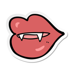 sticker of a cartoon vampire fangs