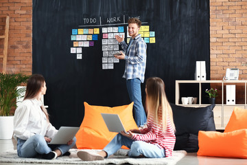 Young IT specialists working in modern office