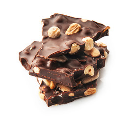 Tasty dark chocolate with nuts on white background